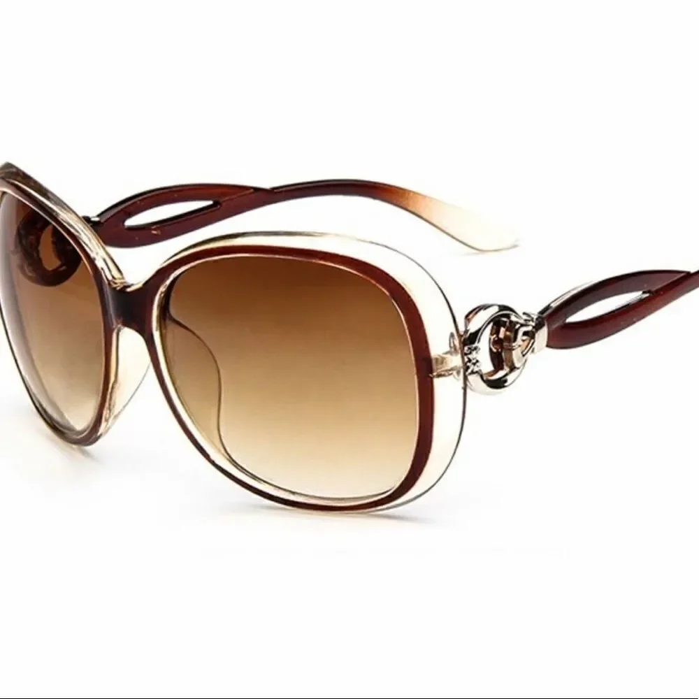 NWT hollow frame anti-UV oversized sunglasses . Have Brown and Black .